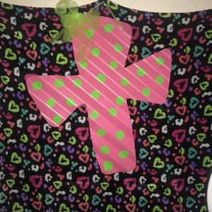 Pink and green cross